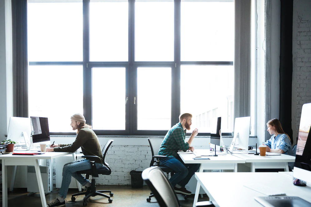 young-colleagues-work-office-using-computers_171337-6718.jpg