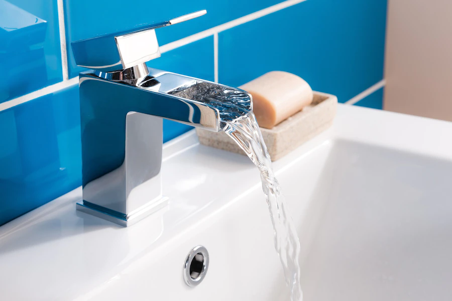 new-modern-steel-faucet-with-ceramic-sink-bathroom_181624-29441.jpg